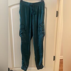Francesca’s emerald colored joggers, shiny look, size S, great condition